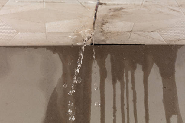 Professional Flood Damage Cleanup technician working in Manchester, ME